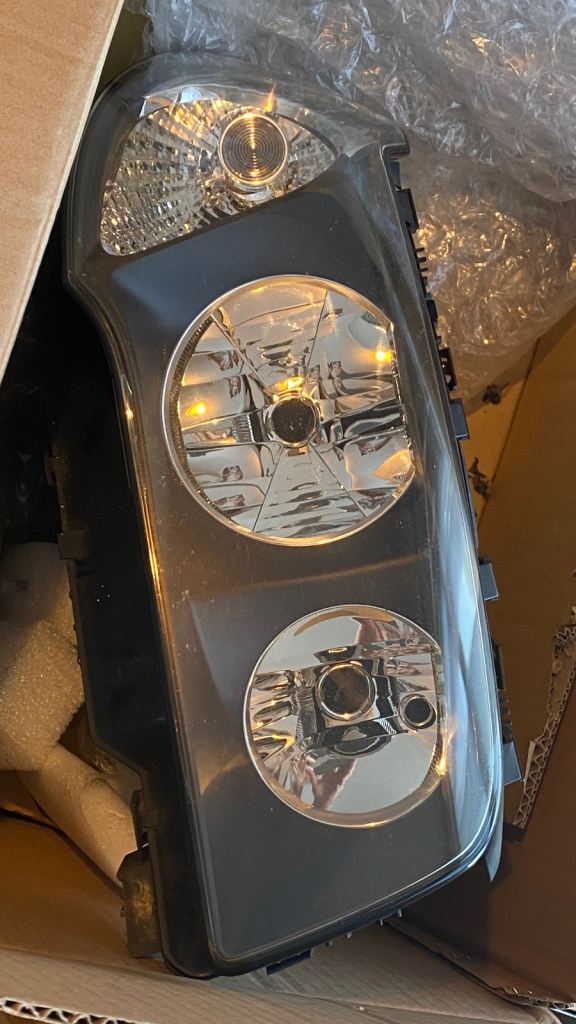 Pair of Original BMW X3 E83 Headlights. Clean lenses.