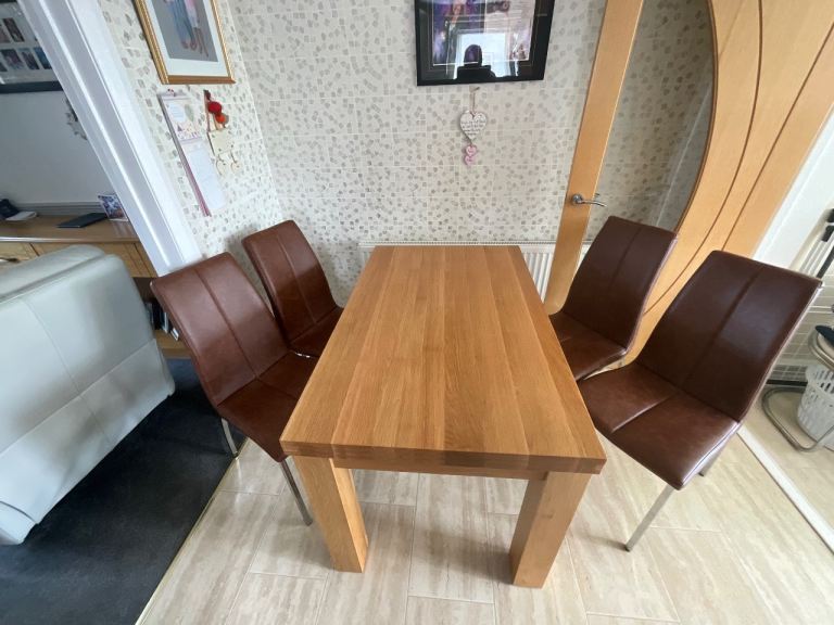 Oak dining table and chairs