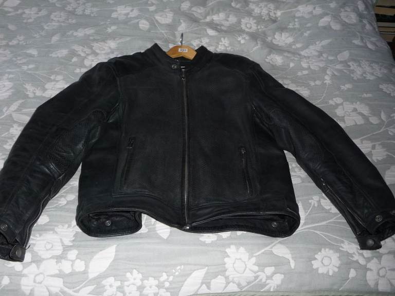 helstons biker leather jacket perferated xl but more large than xl. 