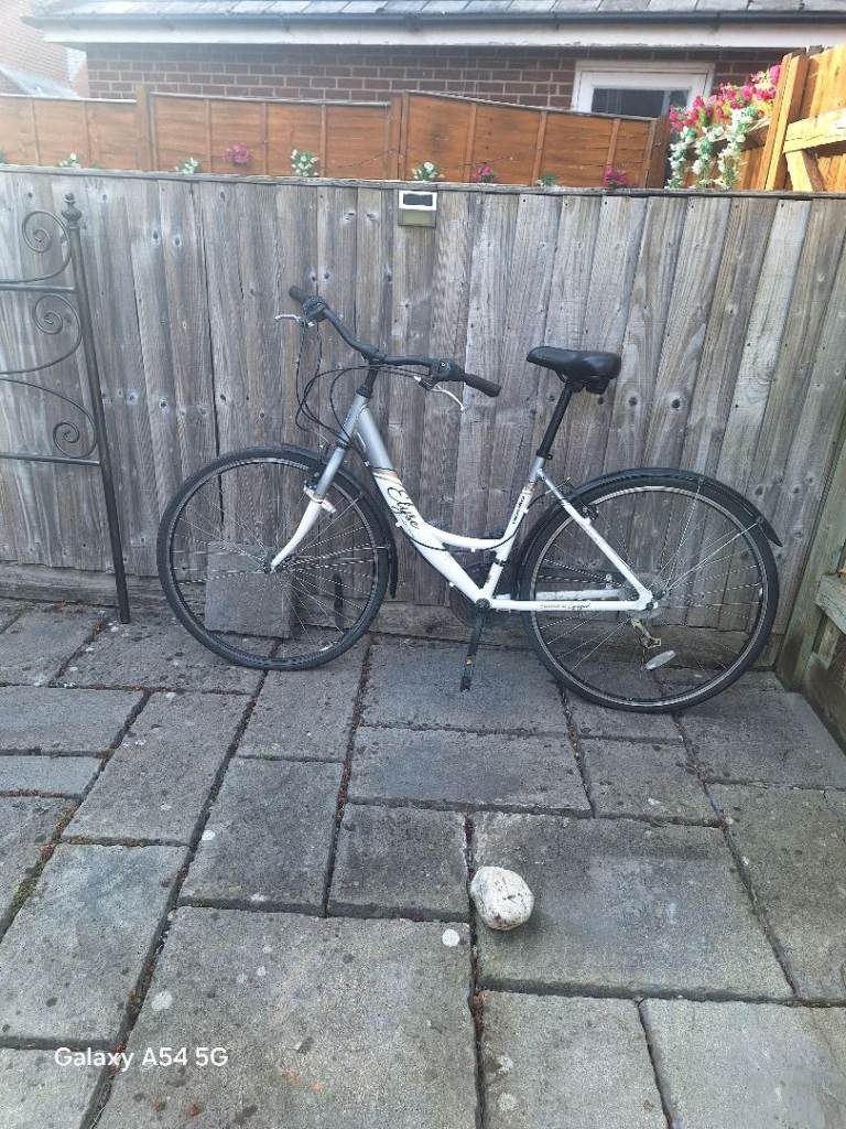 White Hybrid Bike - As shown, for repair or parts.