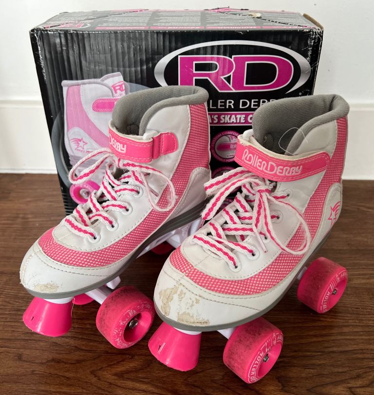 Girls pink roller skates quad size 1