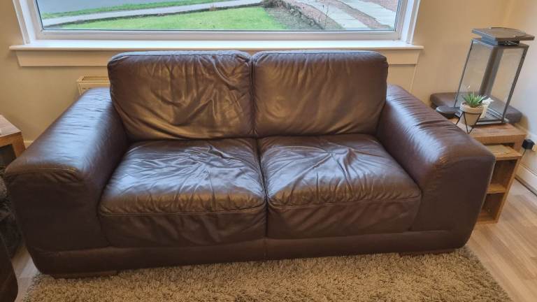Dark brown leather couches 