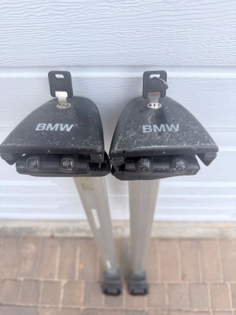 Genuine BMW Roof Bars with functioning locks and 2 keys.