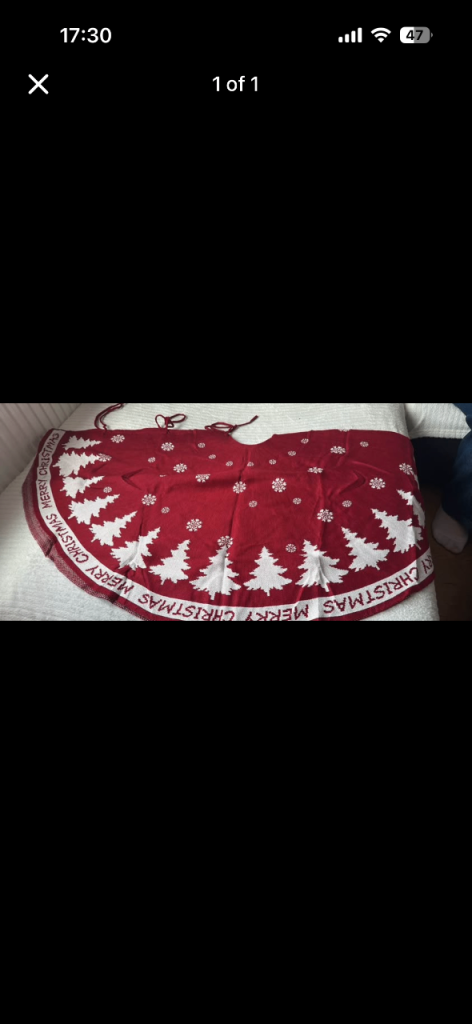 Red Christmas Tree Skirt with White Trees and 'Merry Christmas' Text