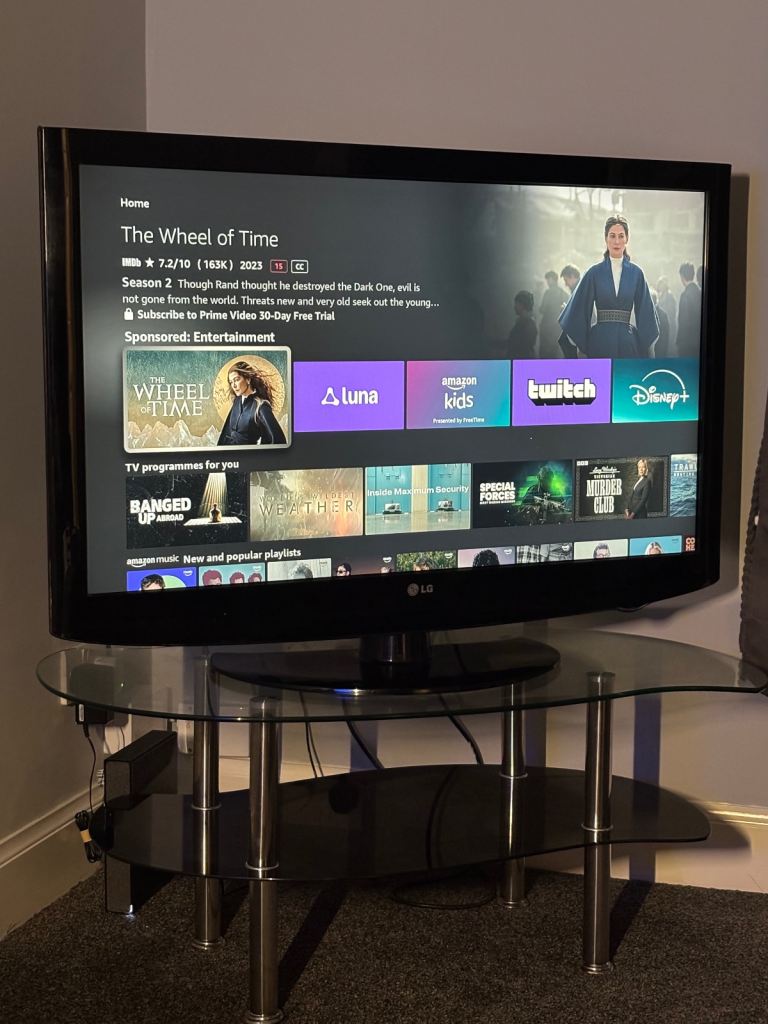 42 inch TV with glass stand - priced cheap to clear space