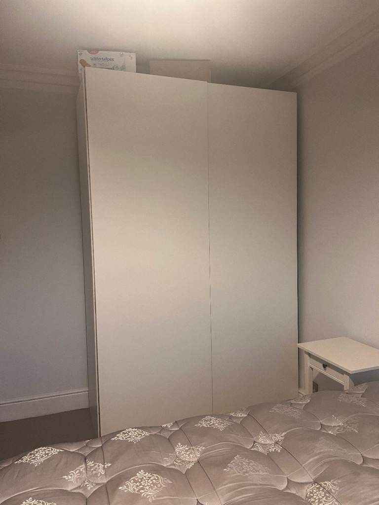 White Pax Wardrobe with Sliding Doors – Good Condition