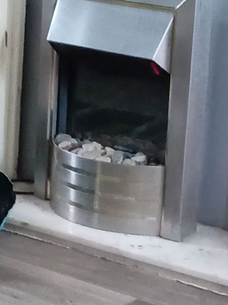 Silver Electric Fireplace Insert with Decorative Stones