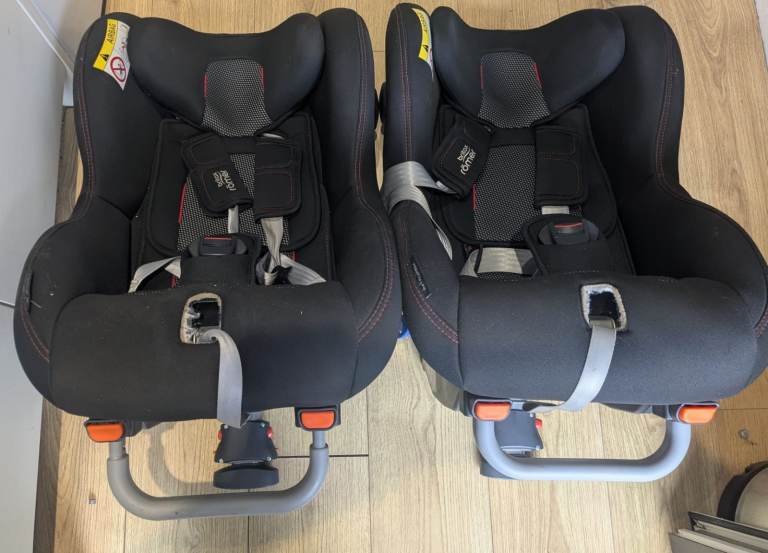 Two Britax Romer Max-Way Plus Rear Facing Car Seats