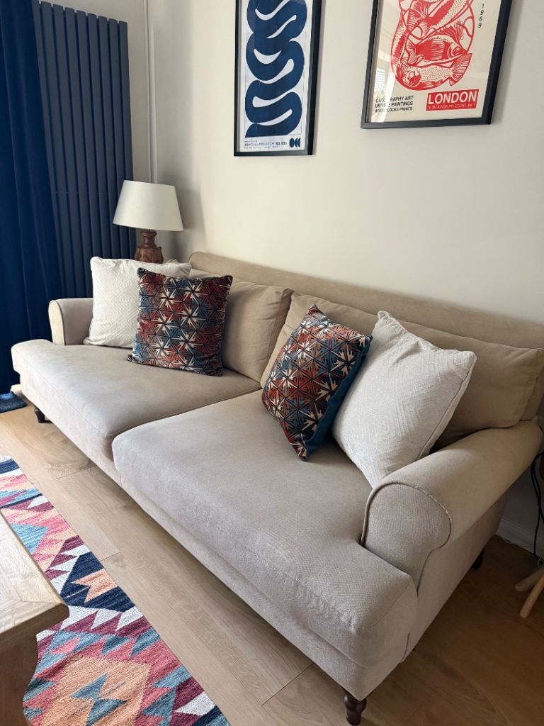 Beige 4 seater sofa 