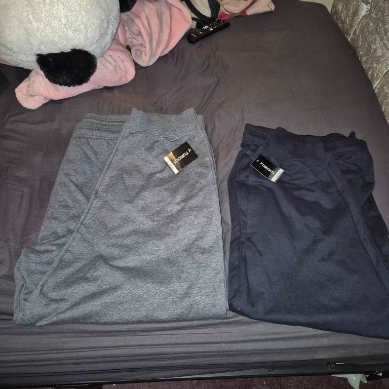 2 pairs of mens brand New jogging bottoms with tags 