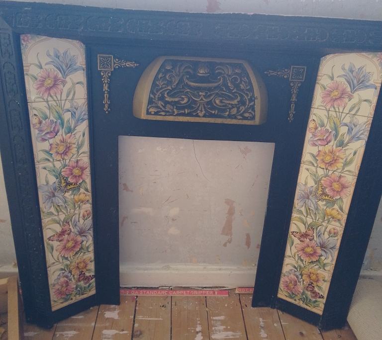 CAST IRON TILED FIRE PLACE 