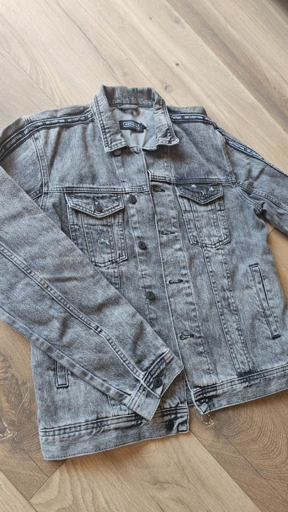 Grey/black denim jacket, size M. ANTIOCH