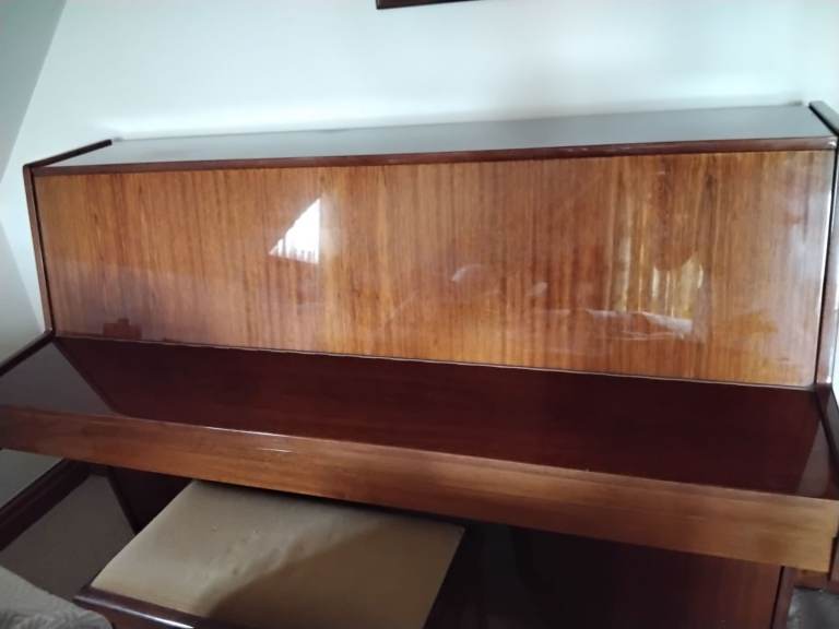 Upright piano with stool