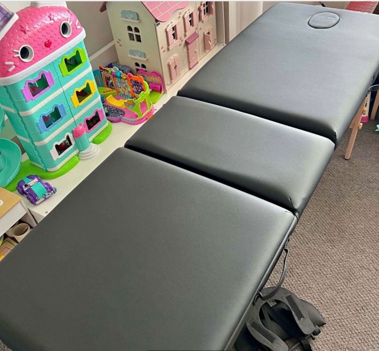 Black massage table (portable)