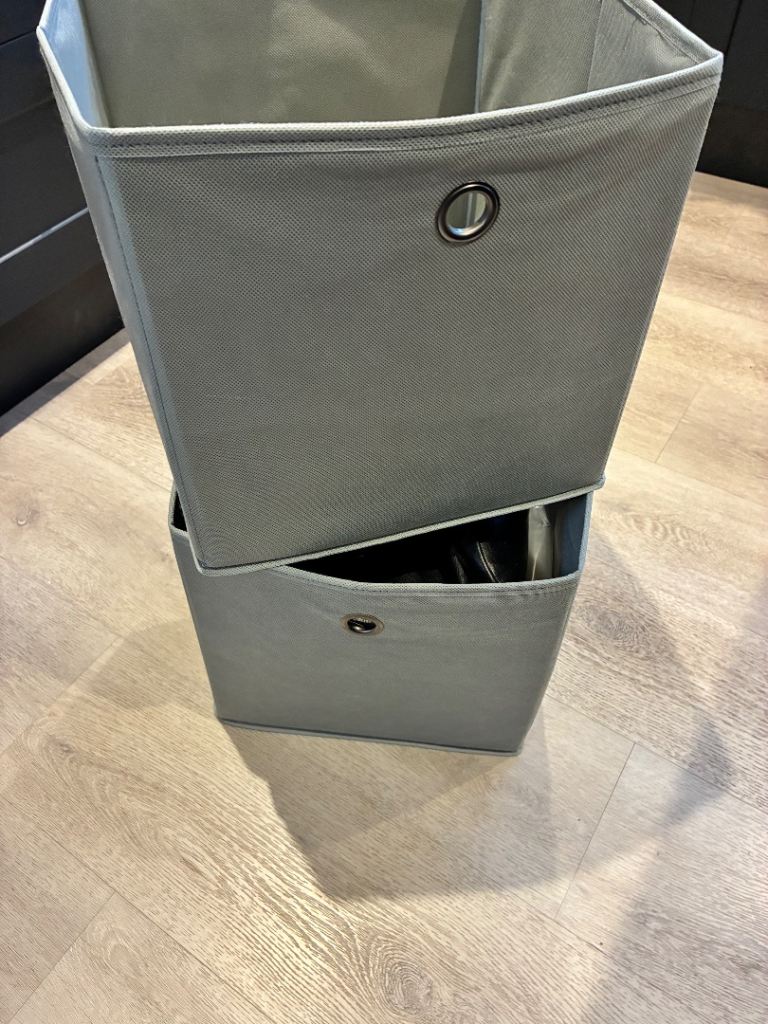 2 grey storage cubes