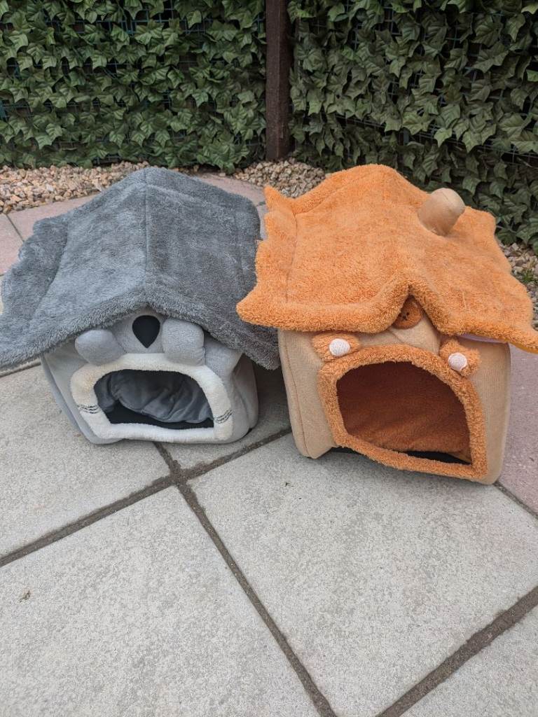 Small cat or dog houses.