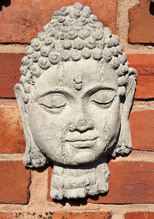 Aged detail Buddha face hanging plaque