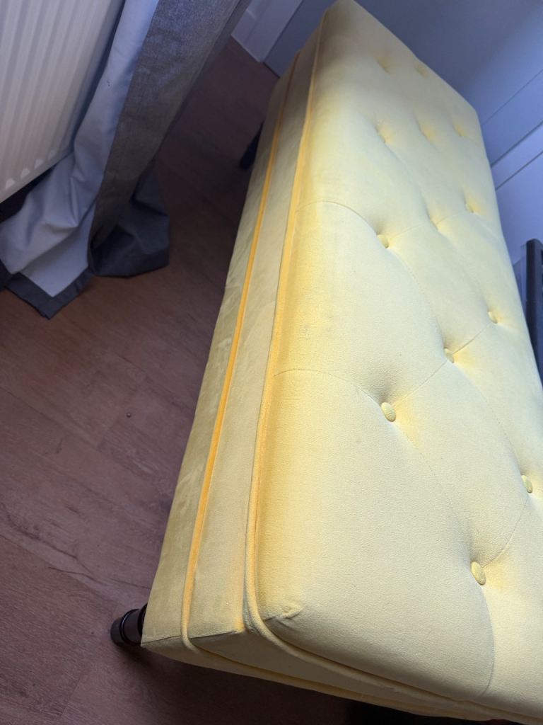 Yellow storage ottoman or blanket box