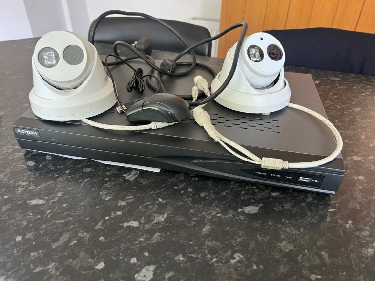 Two Hikvision 4MP CCTV cameras - plus Hikvision model no. DS-7608NI-E2/8P/A NVR Hard drive