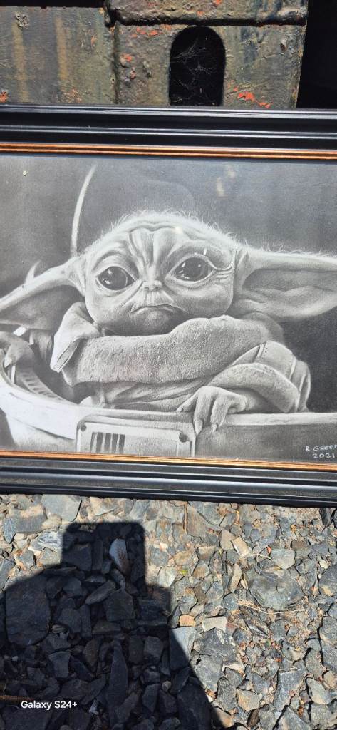 Baby yoda framed picture by local tattoo artist