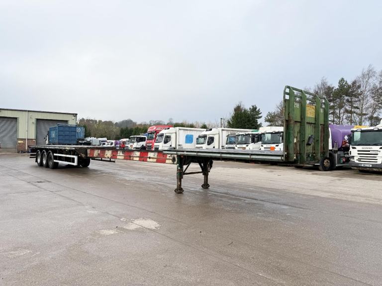 2008 SDC TRI AXLE EXTENDER FLAT TRAILER 
