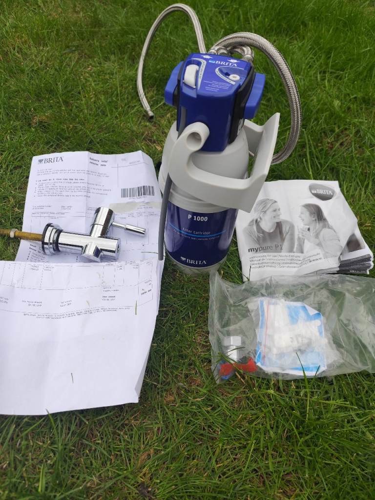 Brita P1000 water filter cartridge and system head systems.