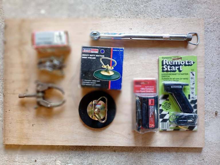 Various Hub and dent pullers, Torque wrench, remote starter and Compact Power Inverter.