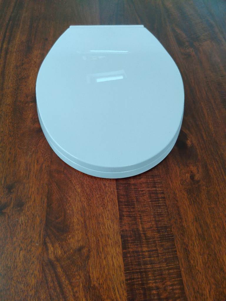 White Plastic Toilet Seat – Brand New