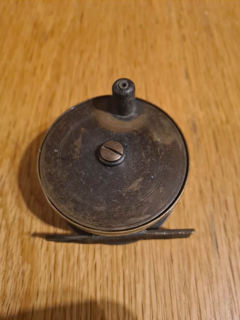 Old brass fly reel 