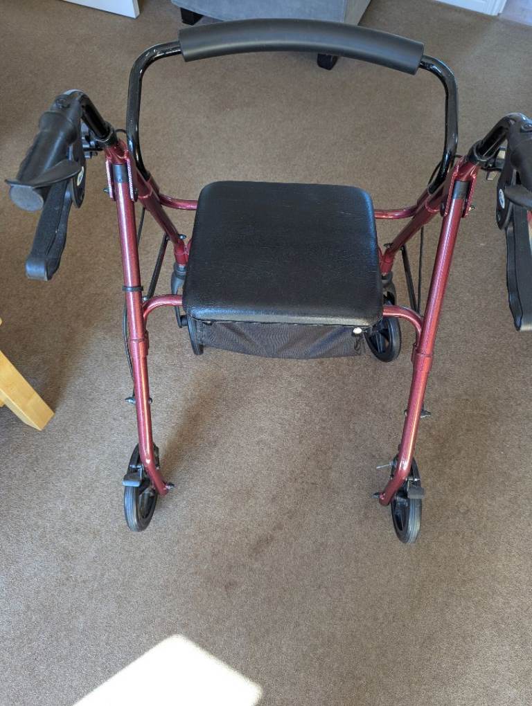 Red Mobility Walker with Seat and Wheels 