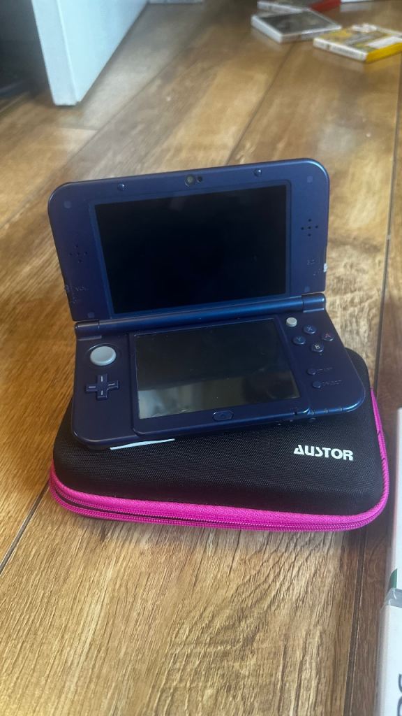 Nintendo 3DS XL Console with Games and Case – Good Condition