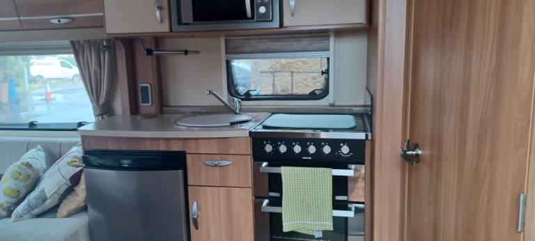 Swift conqueror 480 2 berth 2011 fantastic caravan silver side alder heating