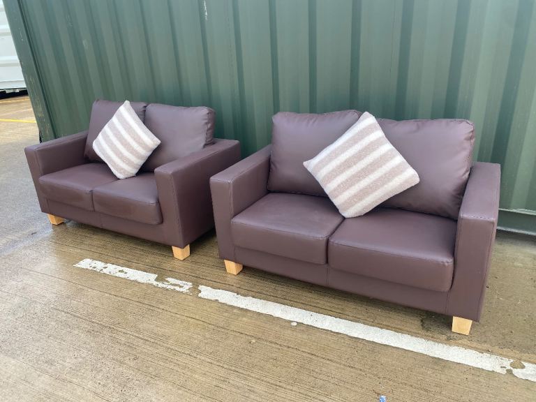 Pair of Small Brown Leatherette Sofas – new condition 