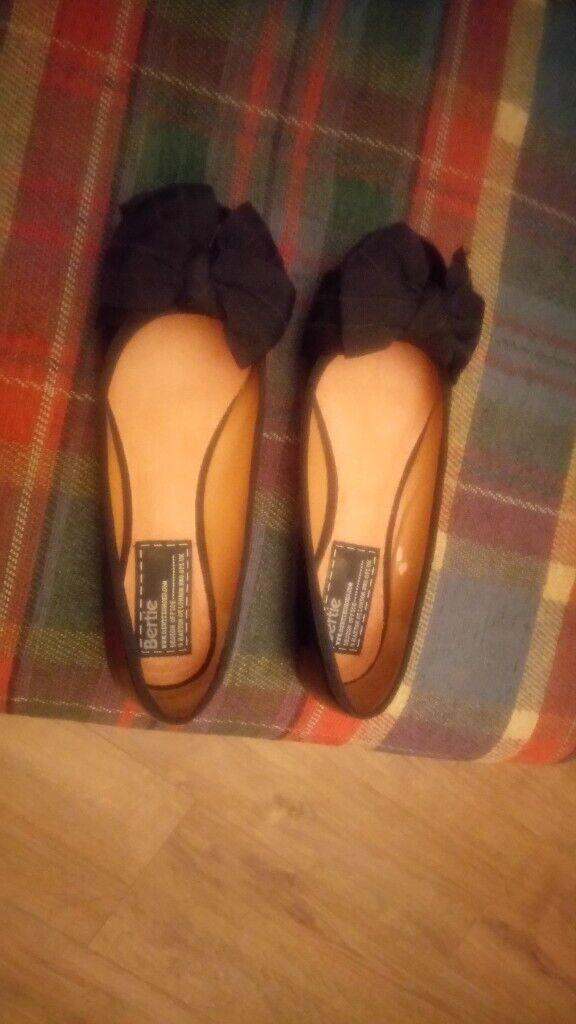 Bertie black flats size 4. Bow to the front imprinted over Bertie