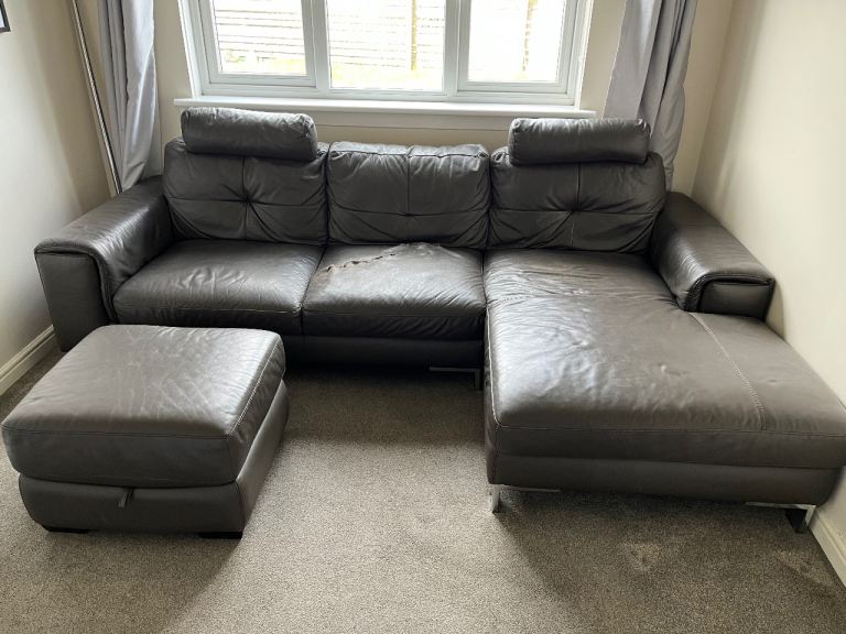 Free to uplift- leather corner sofa (torn) with storage footstool 