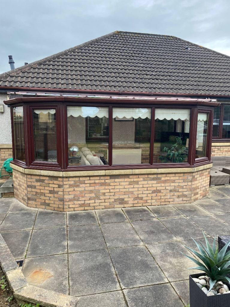 Conservatory with Brick Base and Double Glazed Windows