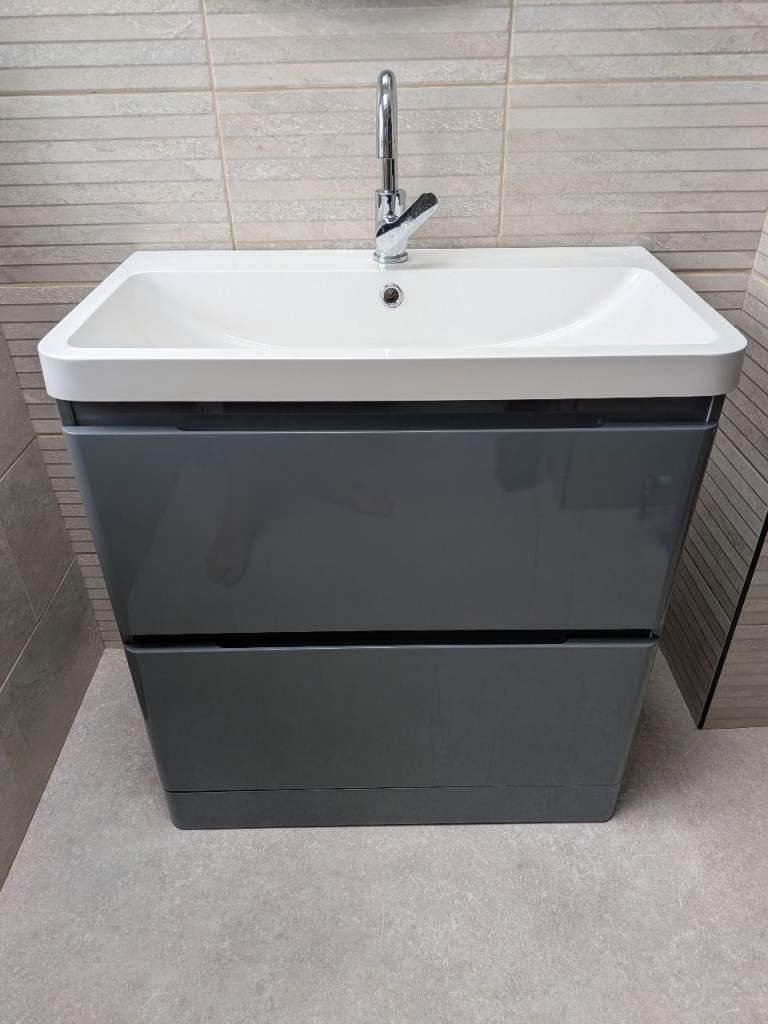 Modern grey bathroom unit with sink 