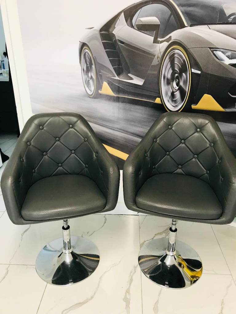 DARK GREY BUTTON BACKED SWIVEL CHAIRS WITH CHROME BASE X2