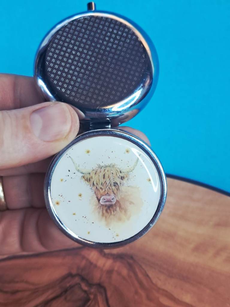This is a Jan Pashley Highland Cow Coo pill box.   As seen. 