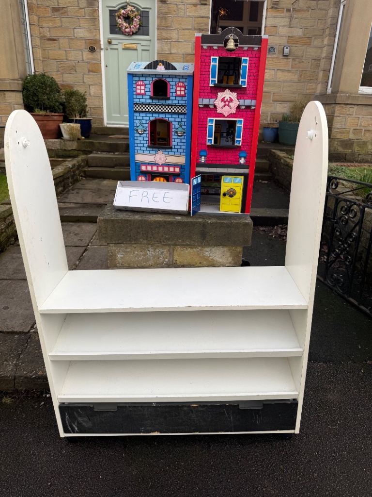 White puppet theatre with shelves and drawer. Chalk board on the back