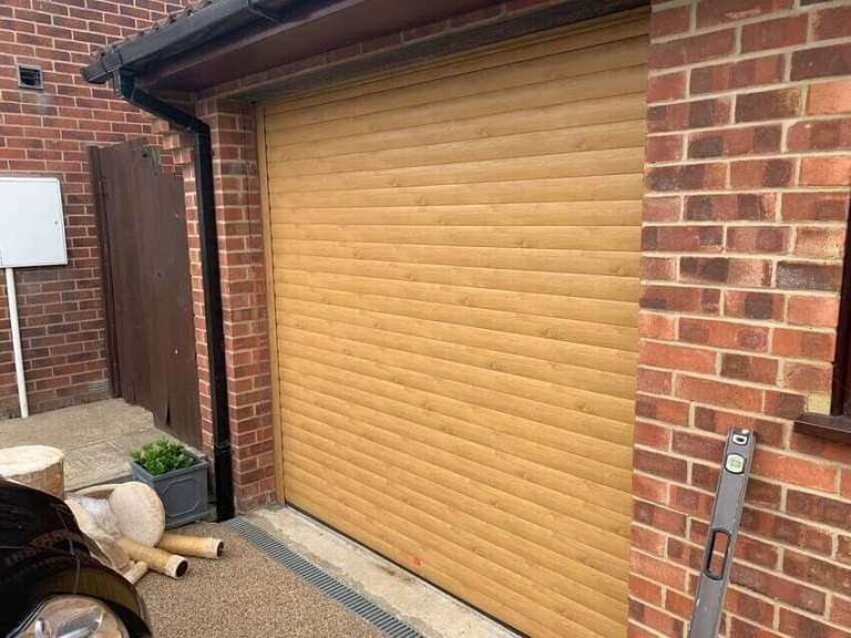 Electric roller shutter garage doors 