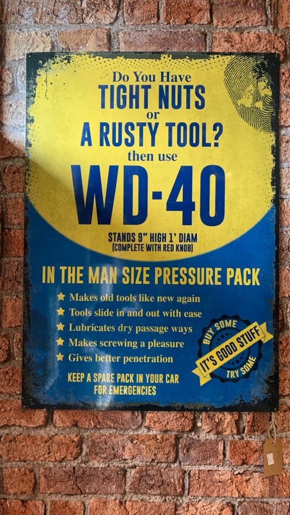 WD-40 metal wall sign