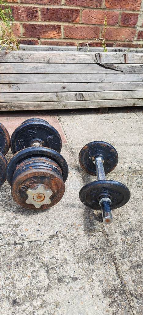 x4 Dumbells with total of 24 kg, 12x1kg and 6x2kg also x4 Kettlebels of 2x6kg and 2x4kg 20 kg 