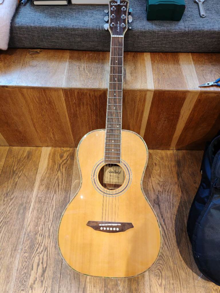 Westfield guitar with case and capo
