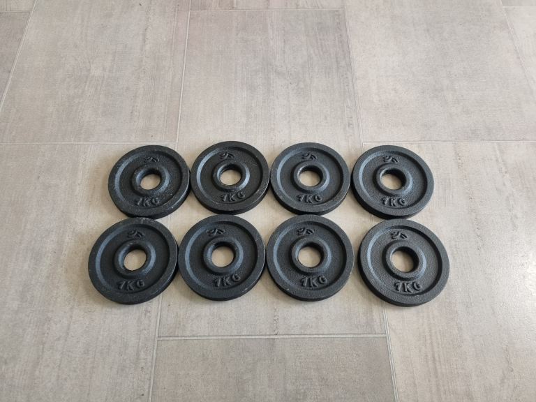 8kg of 1 inch cast iron weight plates £10