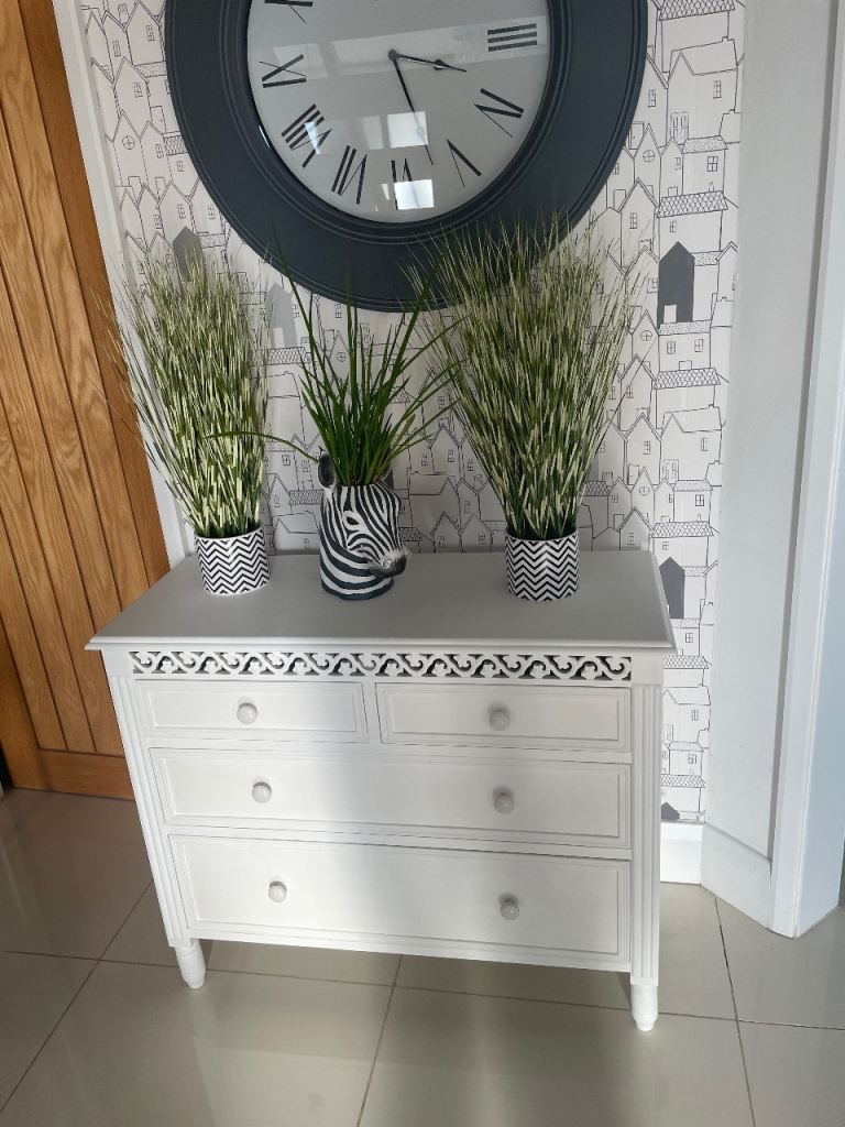 White Chest of Drawers with Decorative Detail