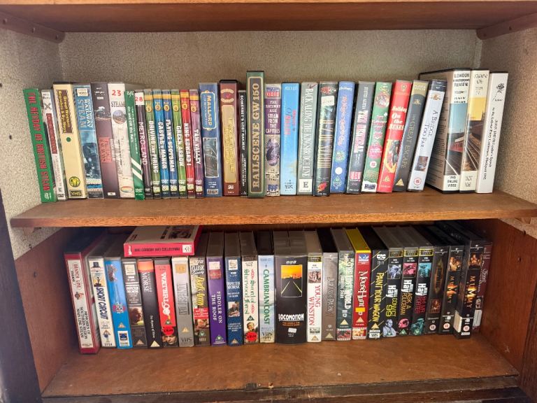 VHS and DVD tapes - some still sealed