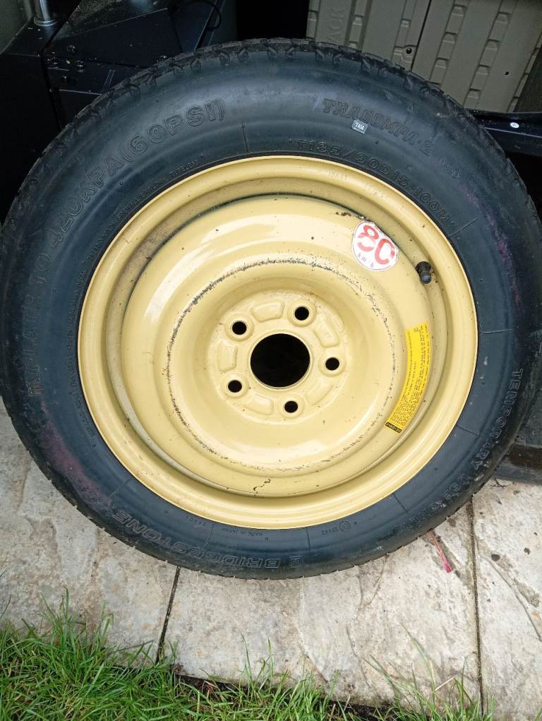 Space saver wheel and unused tyre