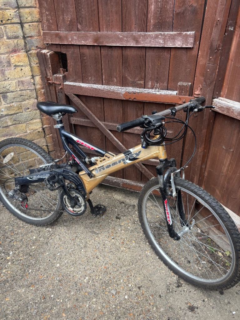 Trax Mountain Bike – Full Suspension, Fair Condition