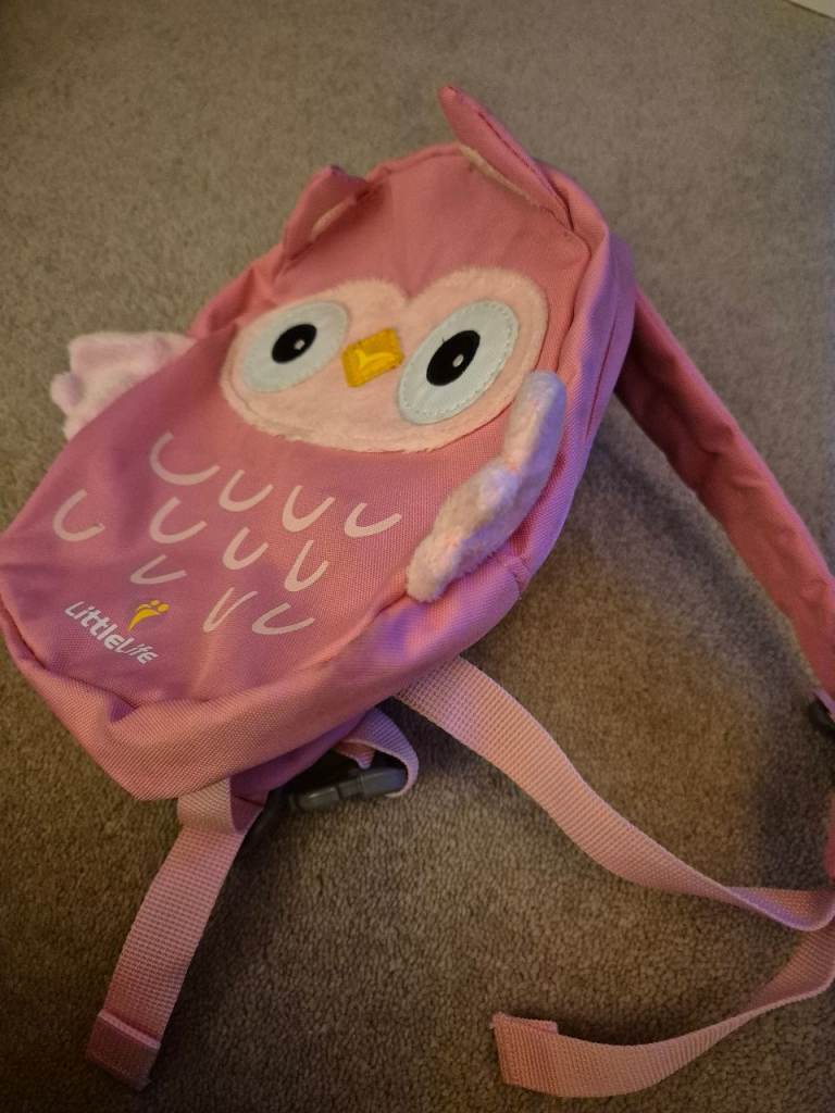 Bundle of toys and dressing gown.